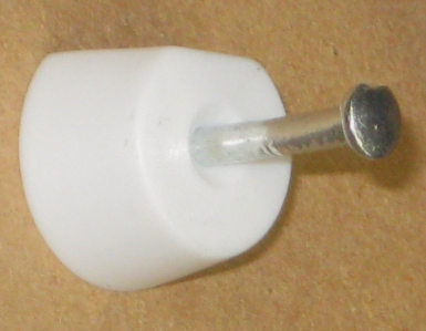 WHITE PLASTIC NAIL SHELF PEGS BAG OF 100 P. DIAYTAR NIGERIA: Your partner in affordable online retail with reliable delivery across the nation.